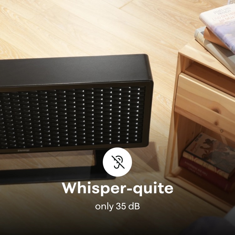 Black color Ofen 2 on a wooden floor with 'Whisper-quiet' text indicating 35 dB.