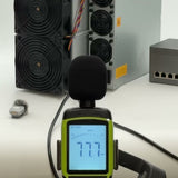 Sound level meter measuring the noise of a running Bitmain Antminer S19 in decibels