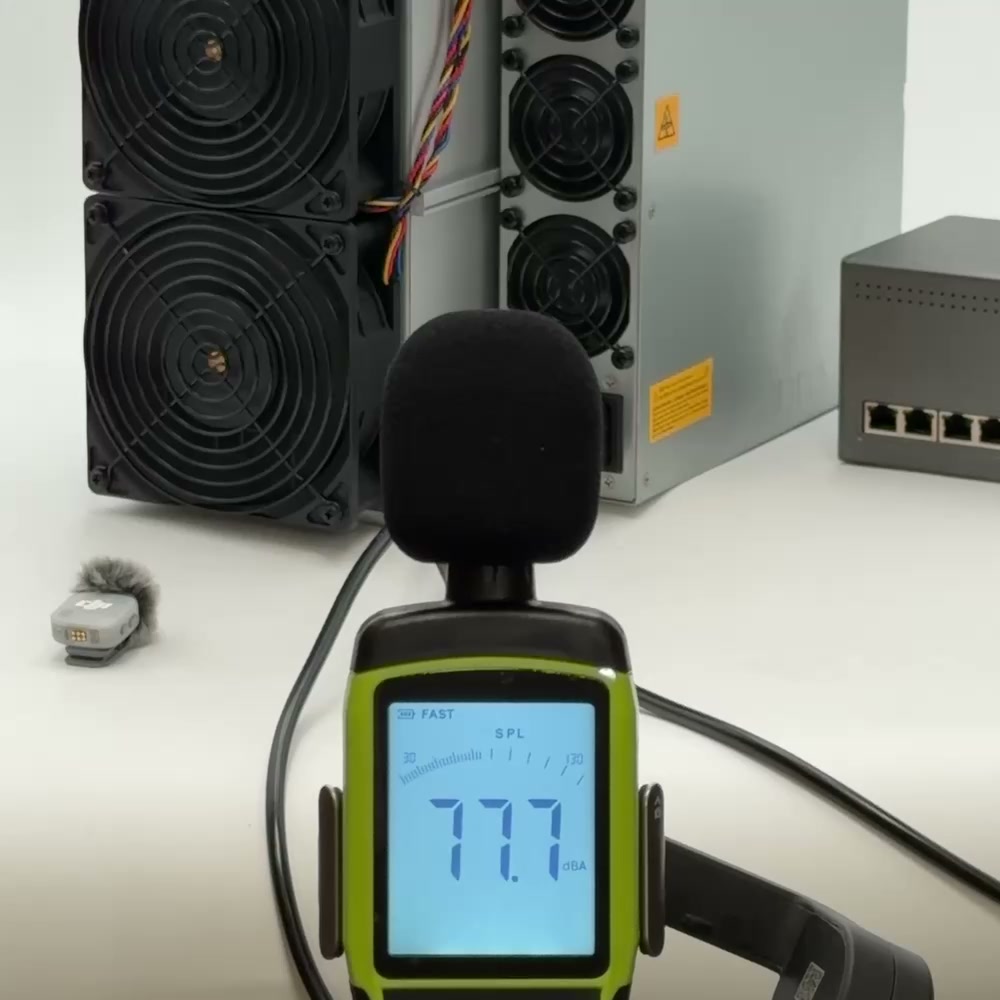 Sound level meter measuring the noise of a running Bitmain Antminer S19 in decibels